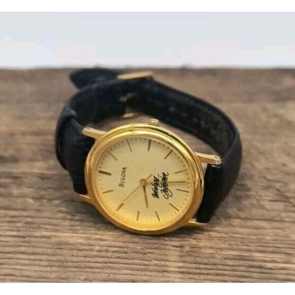 Bulova Accessories - Bullova Classic 33mm "Working Together" Watch Gold Tone Black Leather